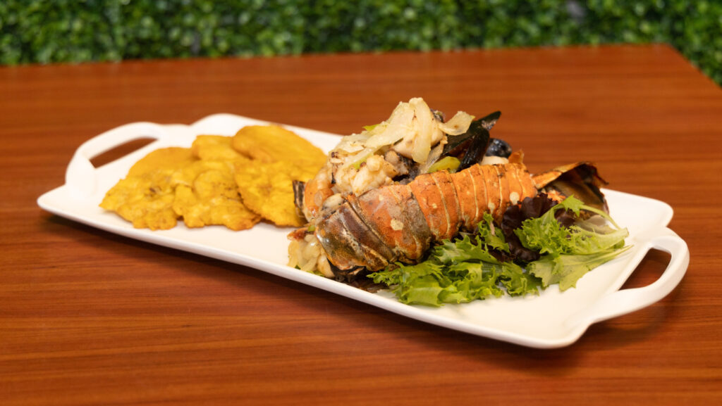 Grilled lobster with seafood & tostones